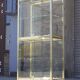 Vitrine vintage en laiton doré et verre, 1970s