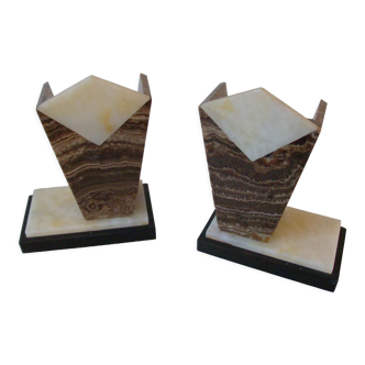Old pair of marble bookends on Art Deco terrace base