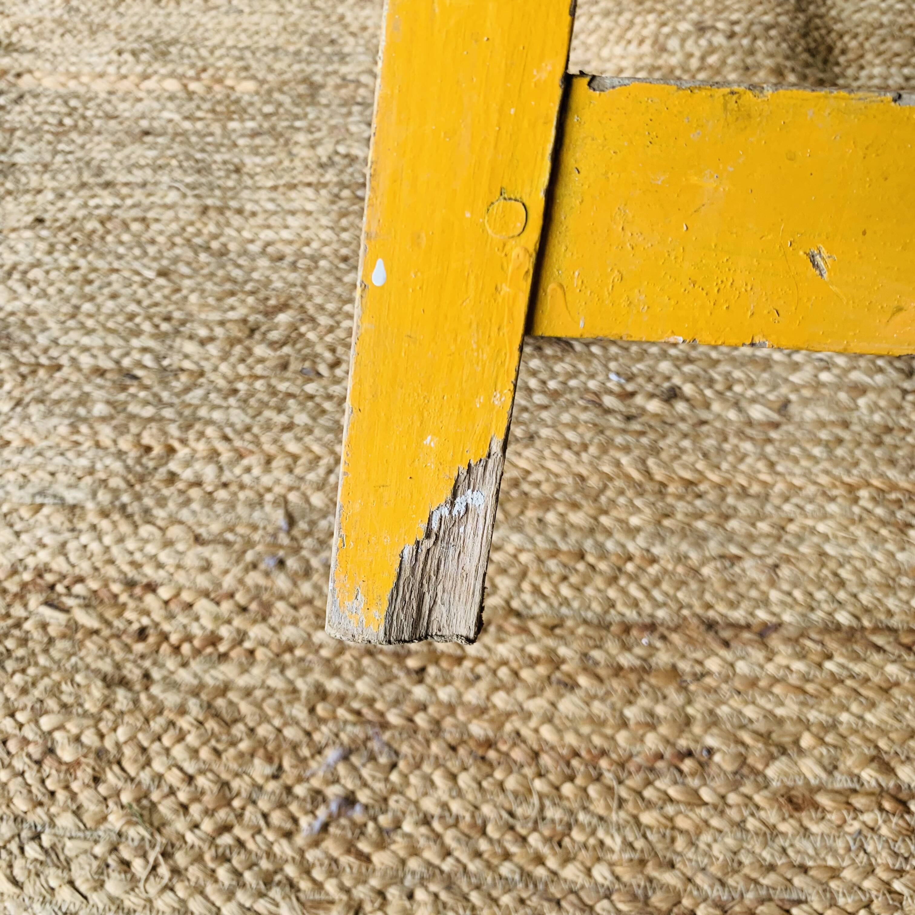 Yellow wooden high stool