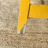 Yellow wooden high stool
