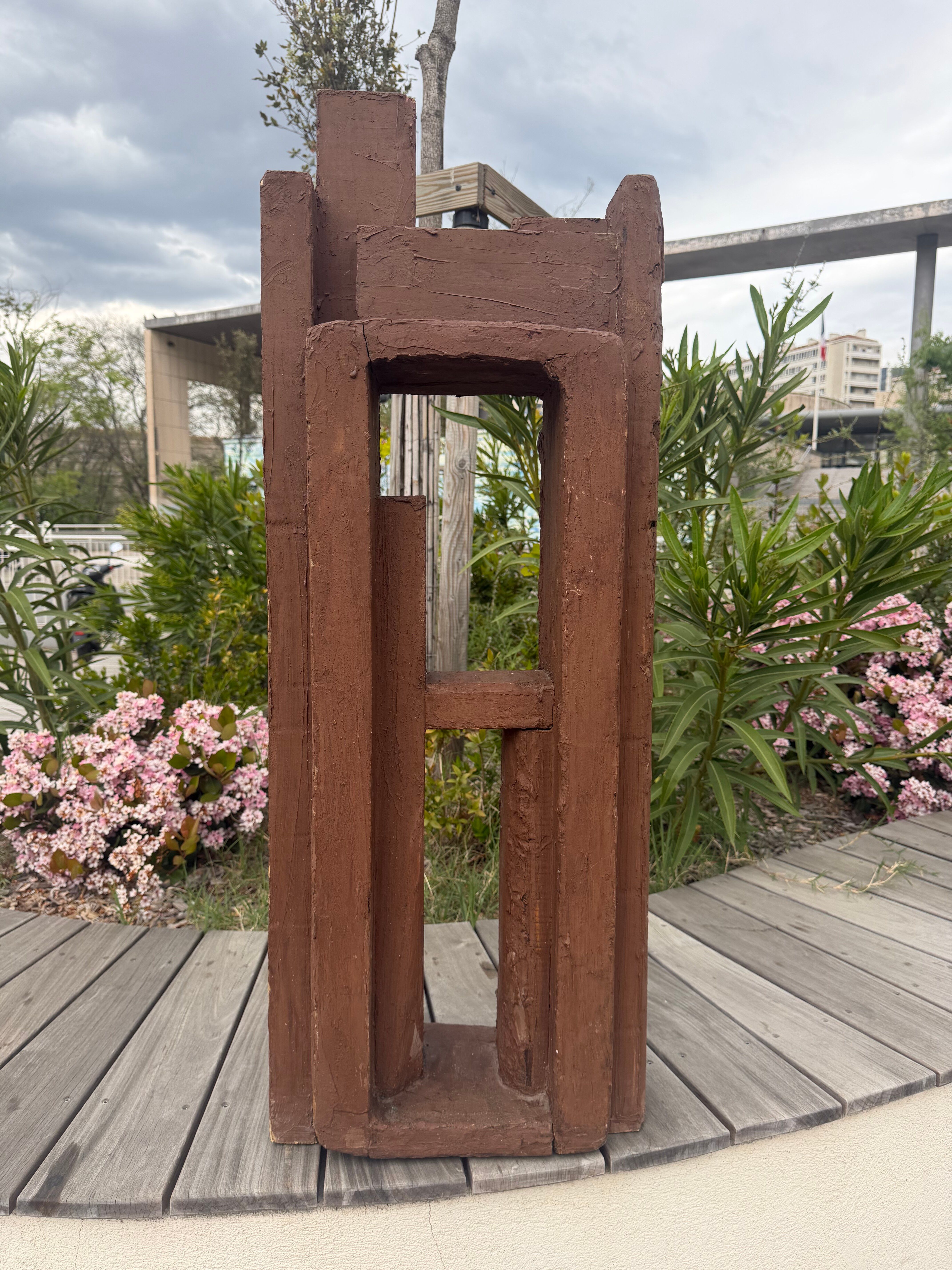 Superb postmodern brutalist sculpture in wood, metal, and material.