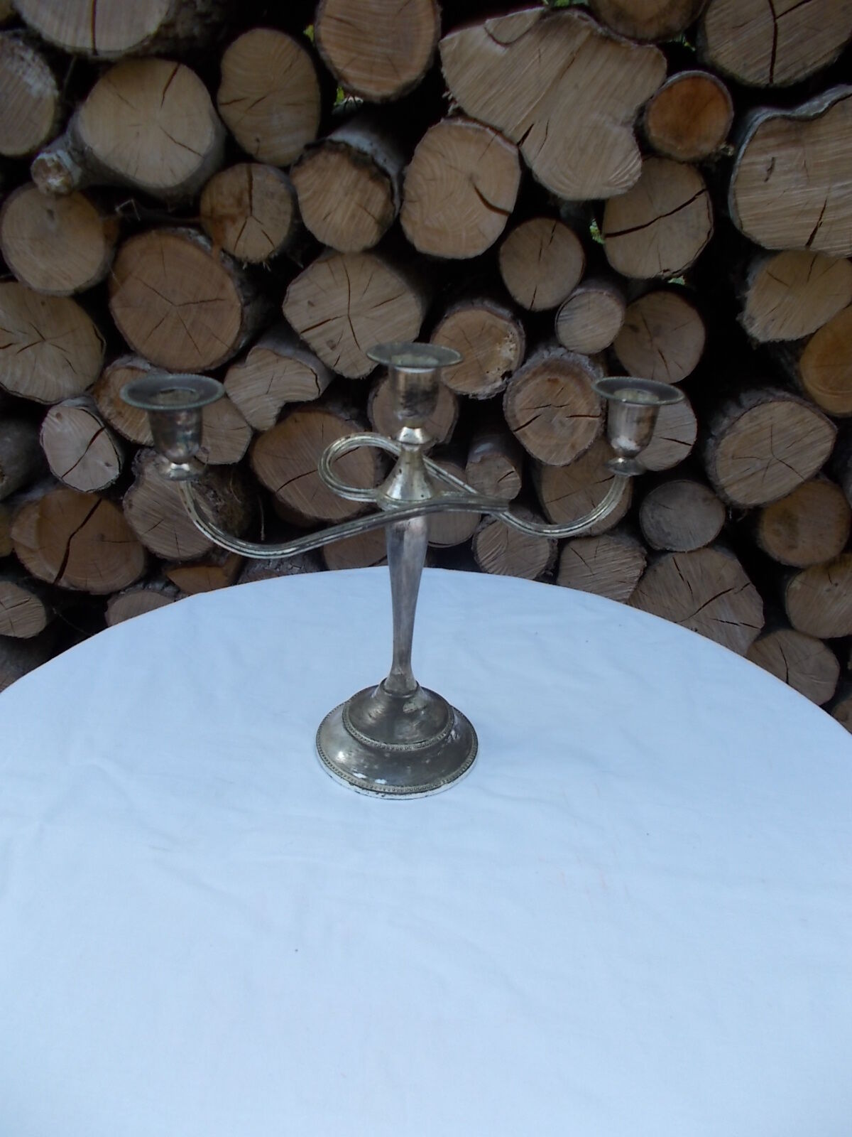 Patinated silver candlestick