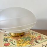 Vintage desk table lamp in antique glass with a brass base.