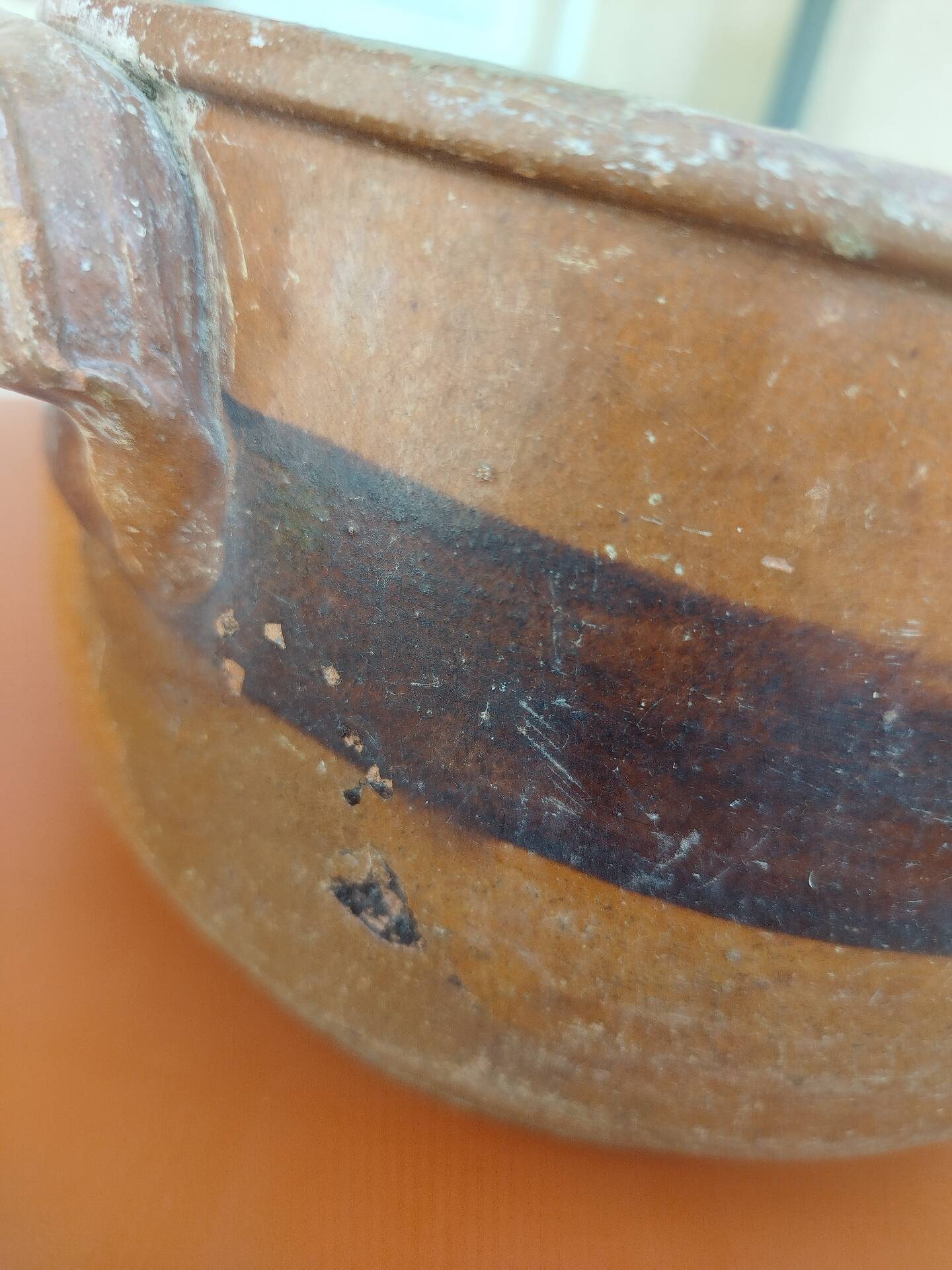 Old terracotta casserole