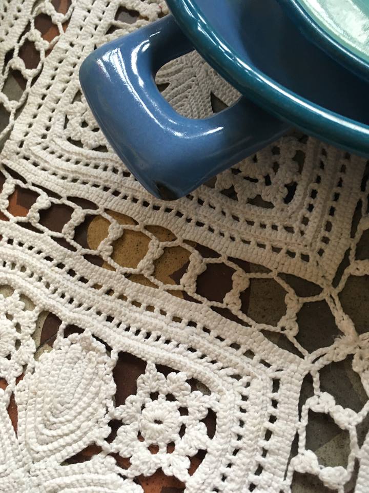 Two matching enameled dishes in green and blue