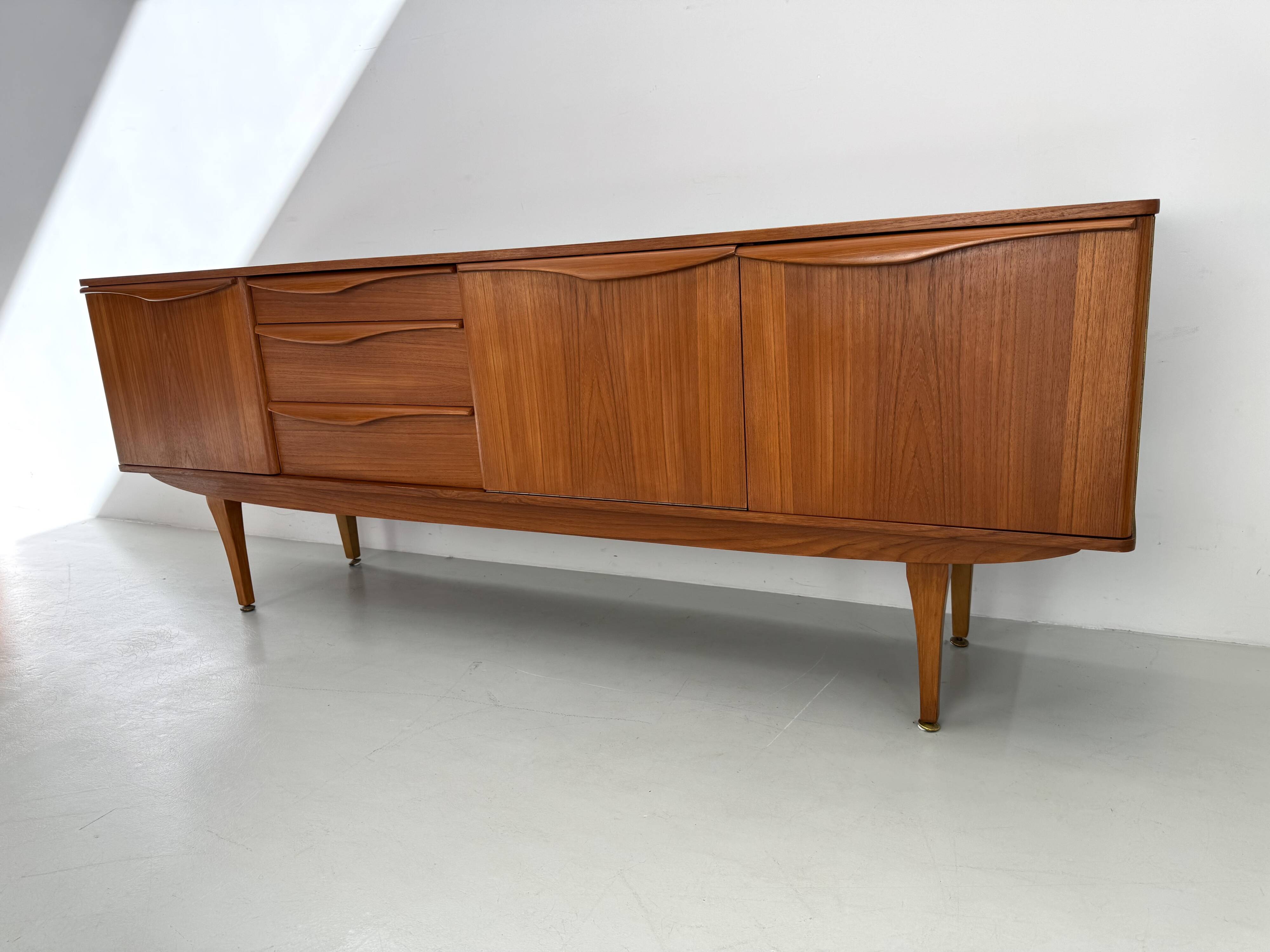 Beautiful and unique Stonehill sideboard from the 1960s made of teak.