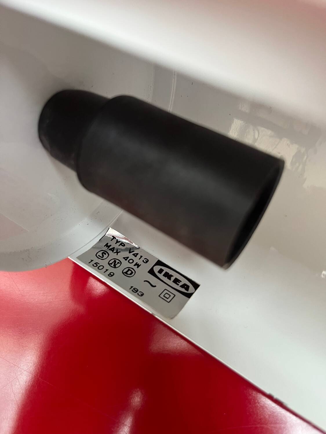 Metal wall light with shutter