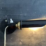 Old black metal and brass wall light, adjustable, 1930s.