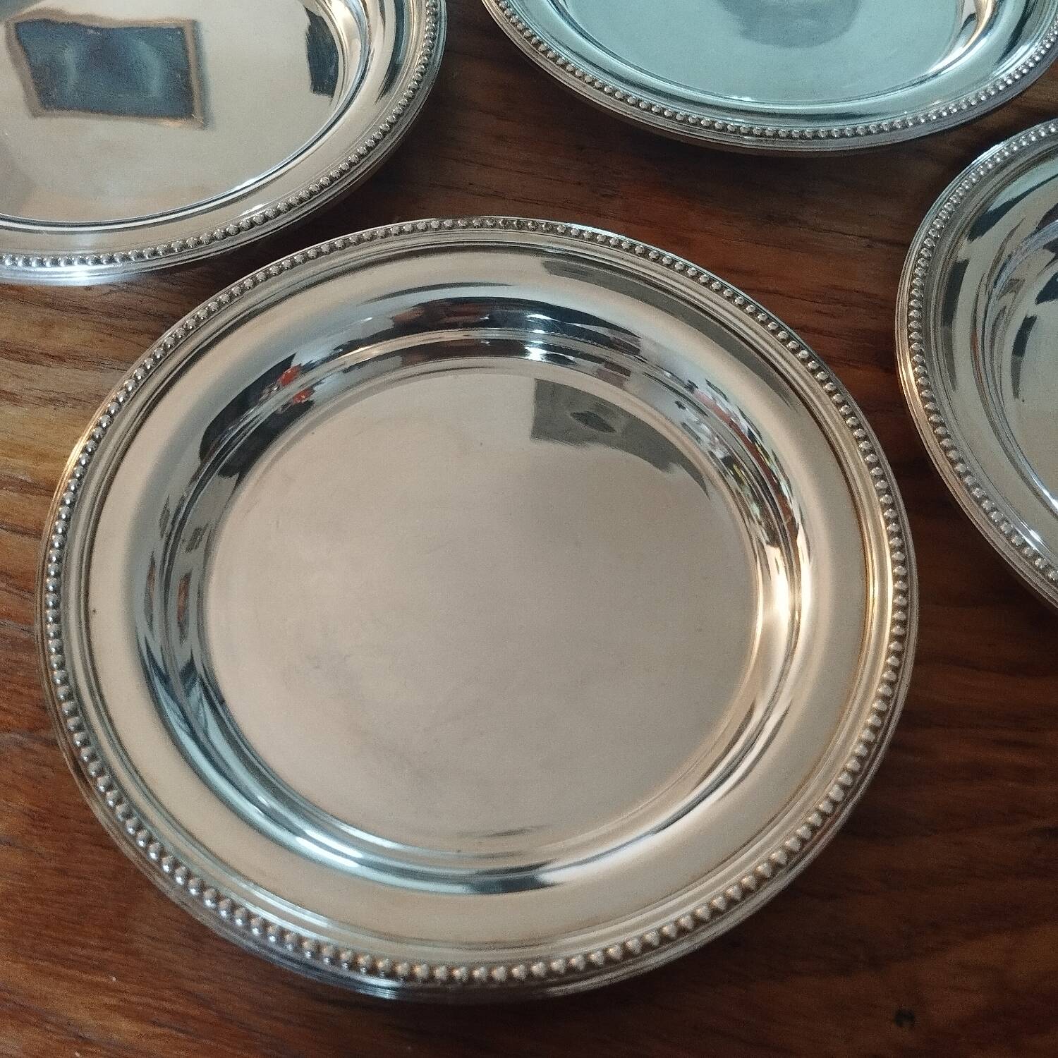 4 Gallia Christofle silver-plated bottle coasters