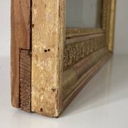 Petit miroir en bois stuqué et doré d’époque Restauration