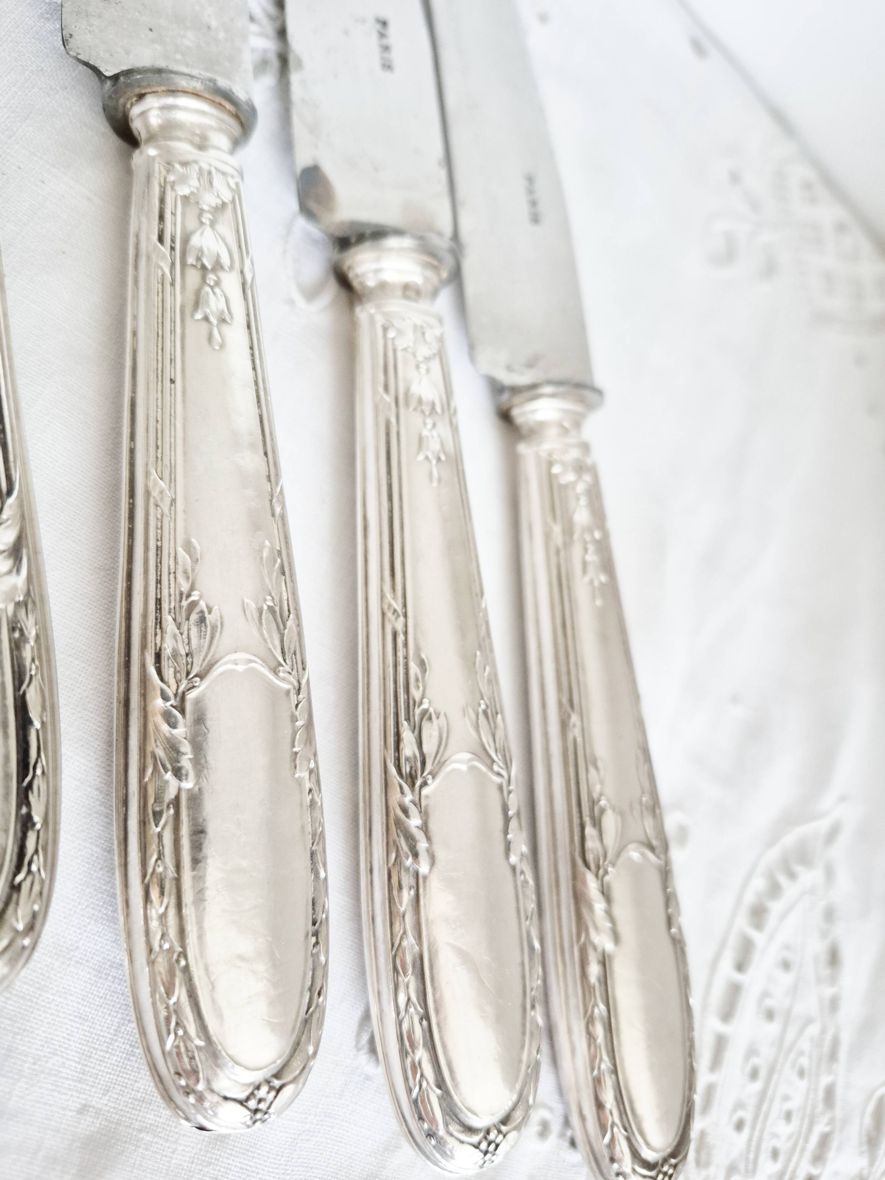 Set of 11 vintage knives, steel blades and silver handles