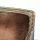 Art Deco design armchair finished in velvet and fitted with decorative nails