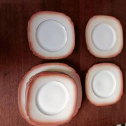 Assiettes à dessert orange en porcelaine