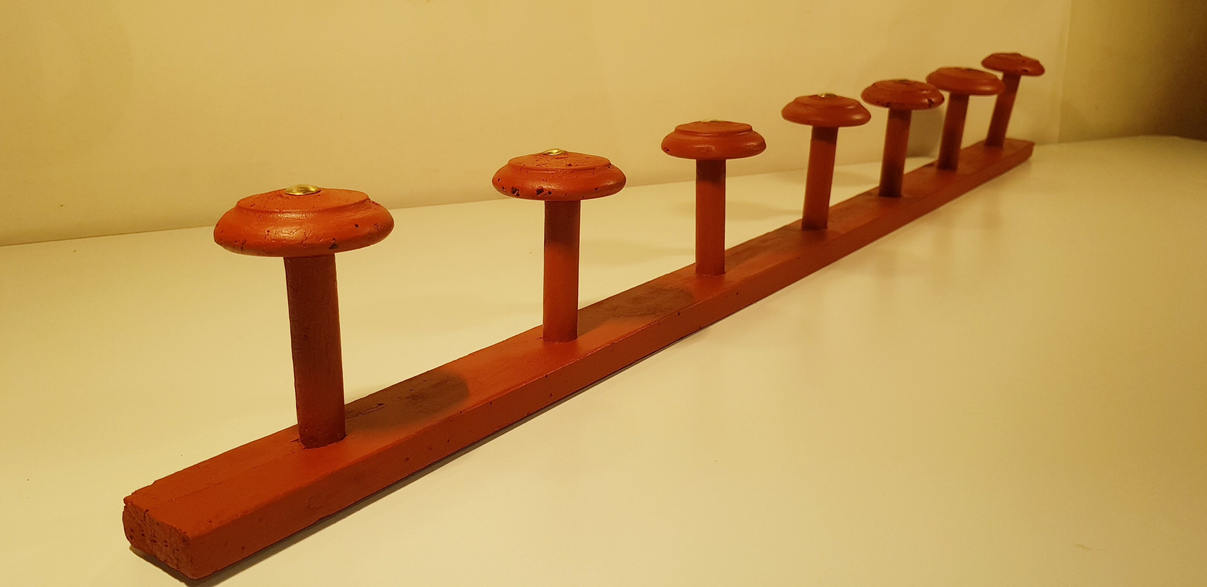 Old wooden wall coat holder