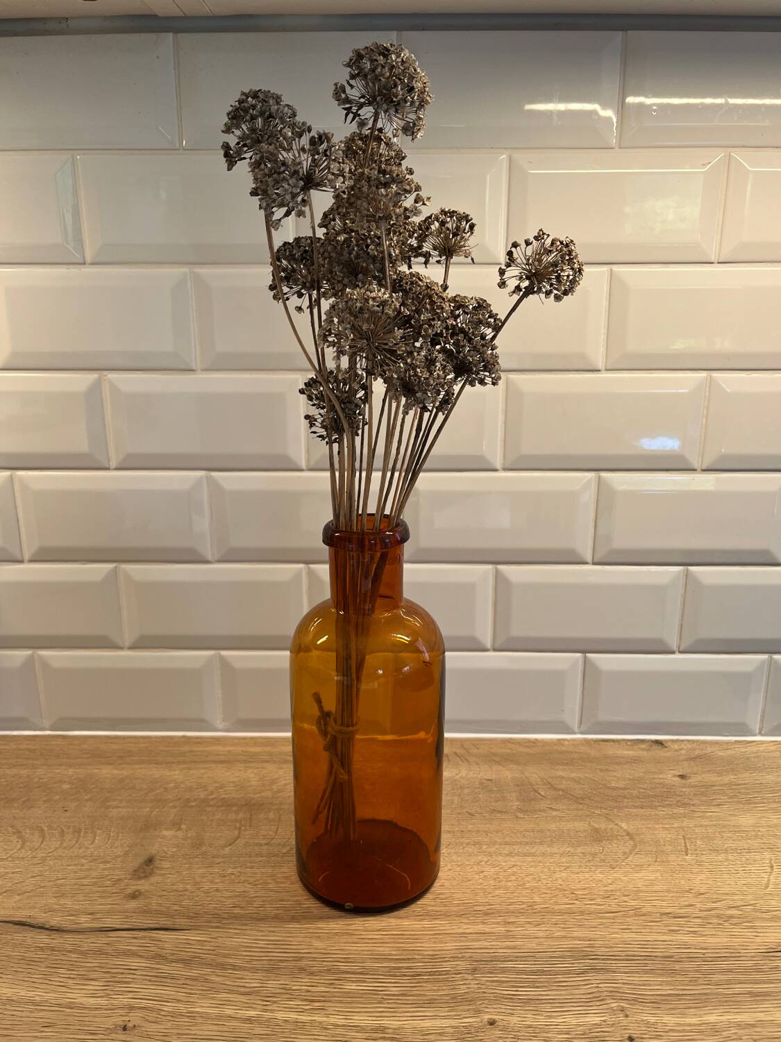 Amber glass bottle vase