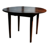 Round table in raw wood