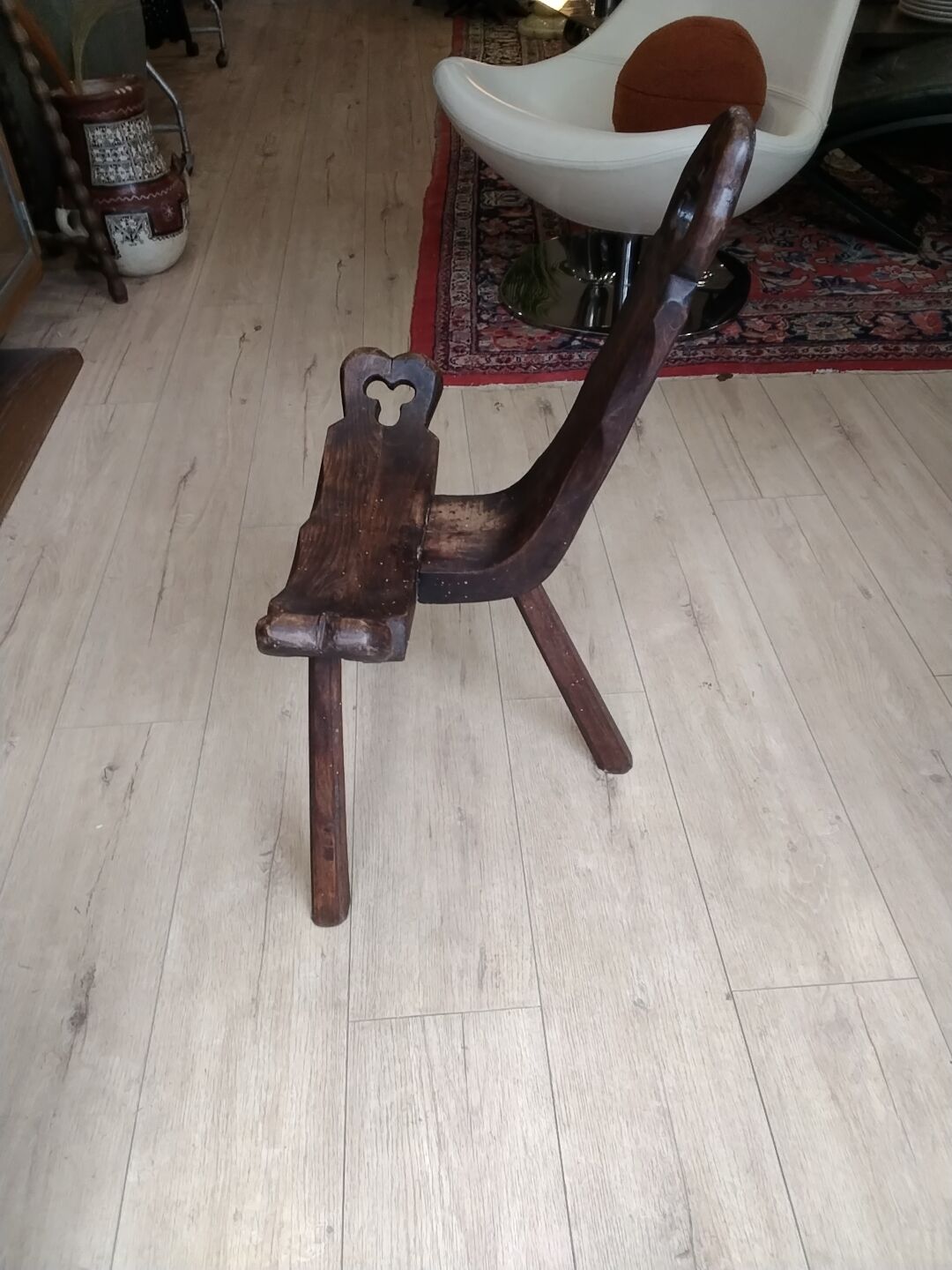 Rustic wooden tripod chair