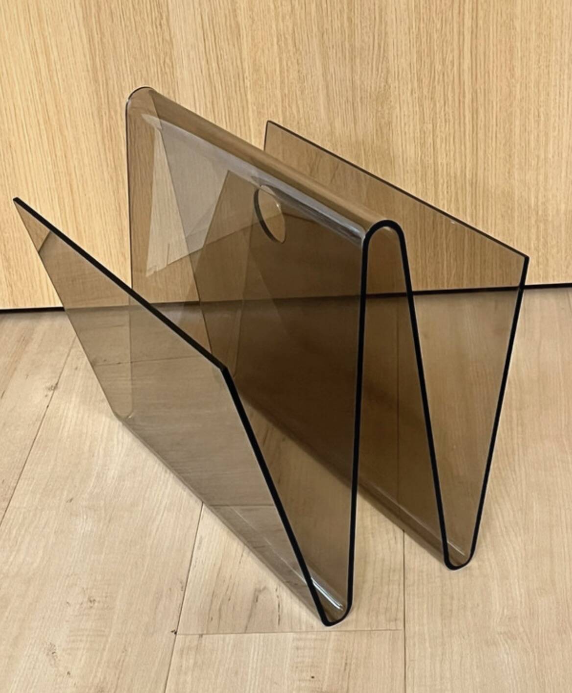 Smoked plexiglass magazine rack in the style of Michel Dumas, France, 1970s.