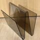 Smoked plexiglass magazine rack in the style of Michel Dumas, France, 1970s.