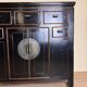 Chinese chest of drawers in black and gold lacquer