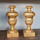 Pair of antique candlesticks with palm support, Tuscany, early 19th century.
