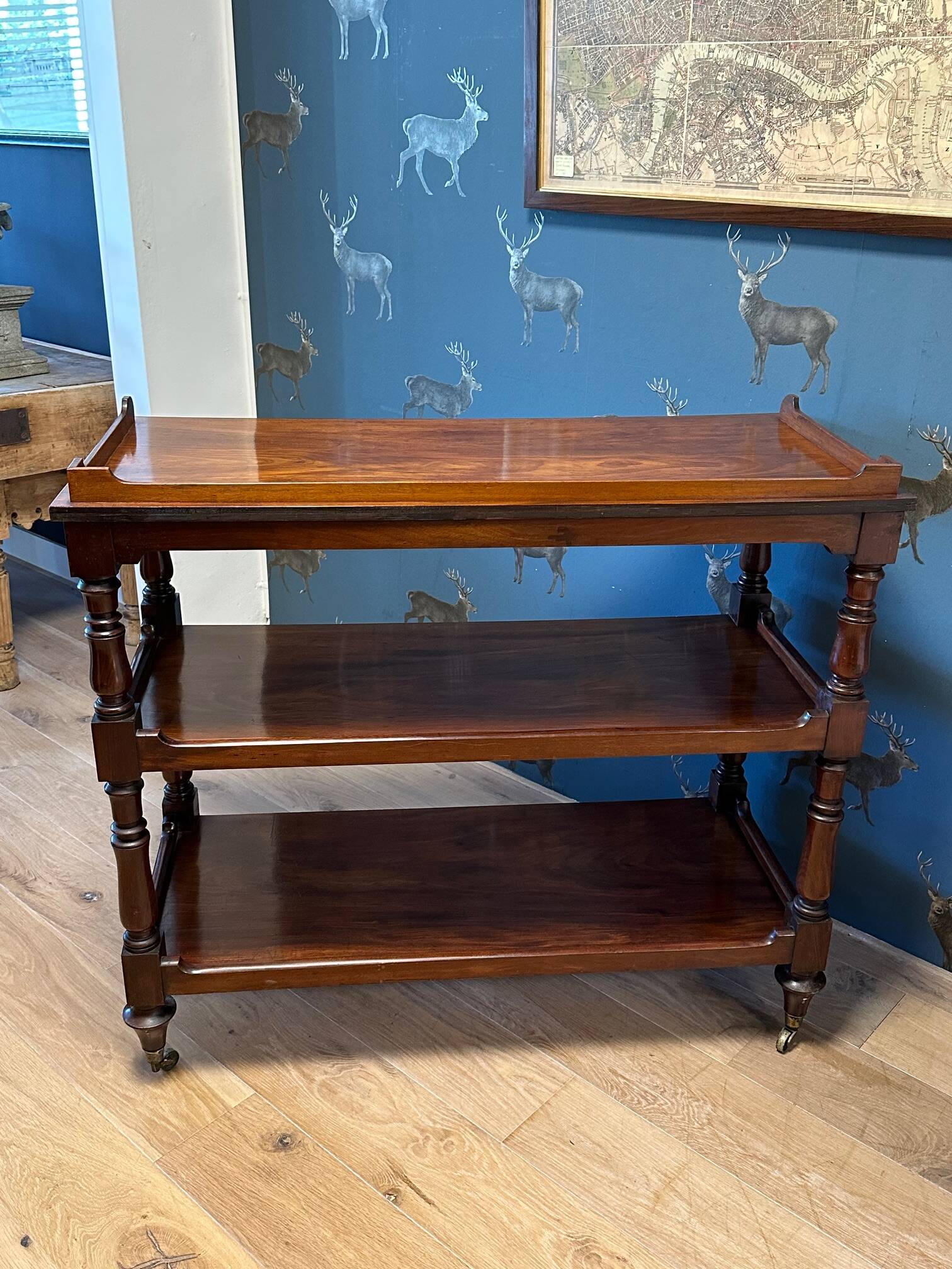 antique mahogany three-tiered étagère