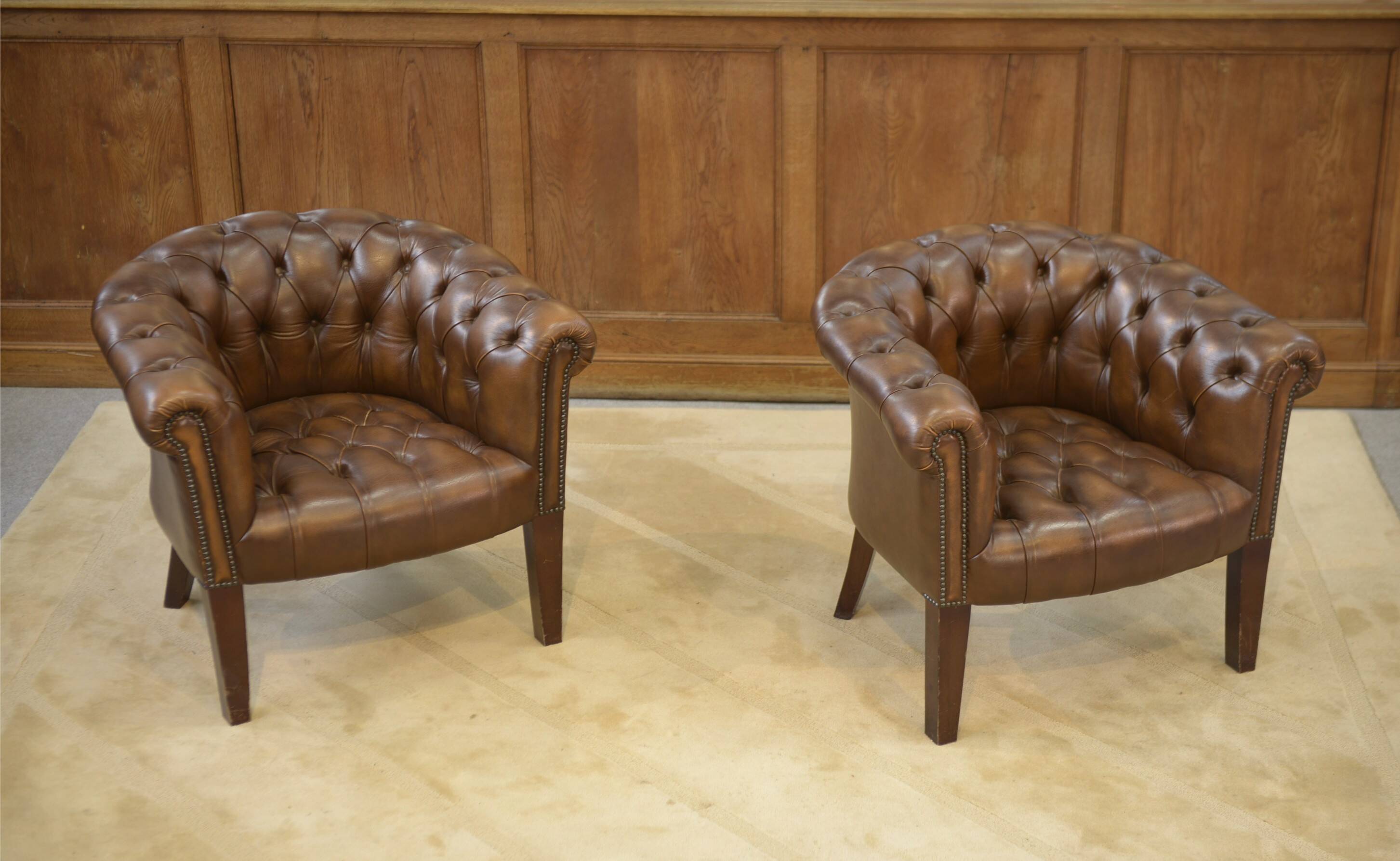 Pair of upholstered leather Club armchairs