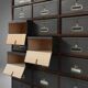 Industrial filing cabinet in wood with 30 original cardboard storage boxes, Belgium, 1920s