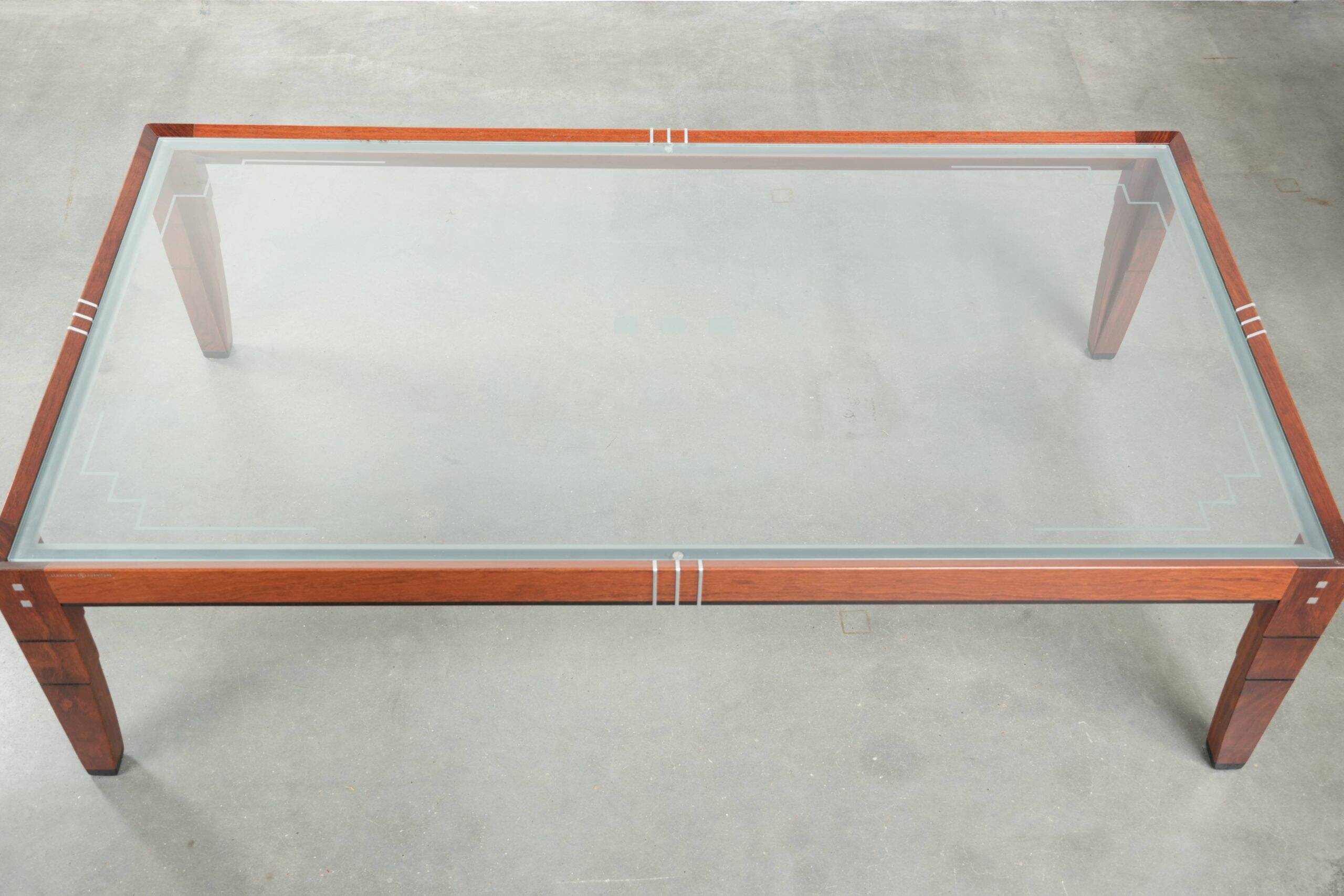 Art Deco coffee table with a glass top in very good condition