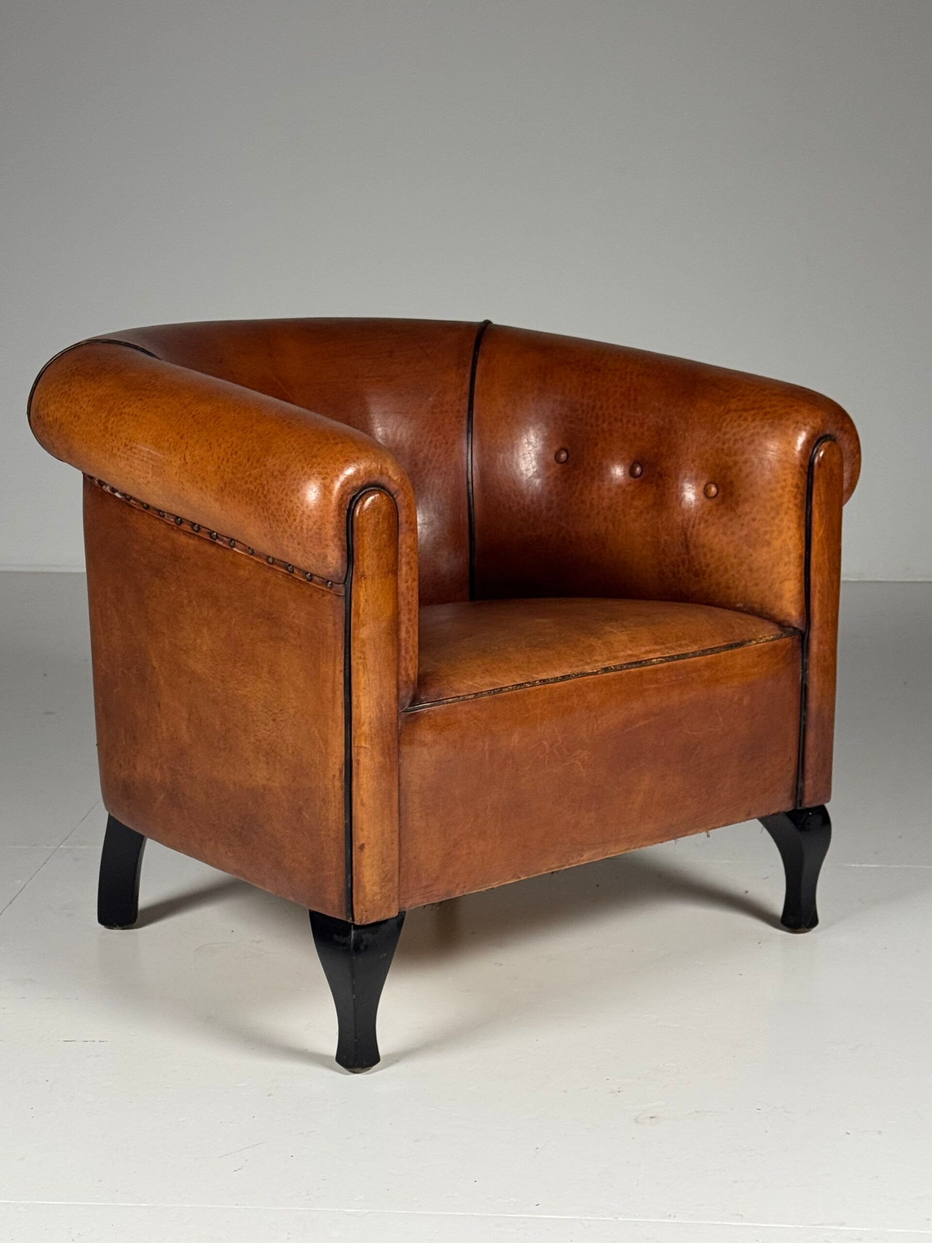 Ensemble de 2 fauteuils club en peau de mouton