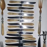 29-piece horn cutlery set, knives and serving utensils.
