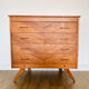 Commode en marqueterie de bois et pieds compas
