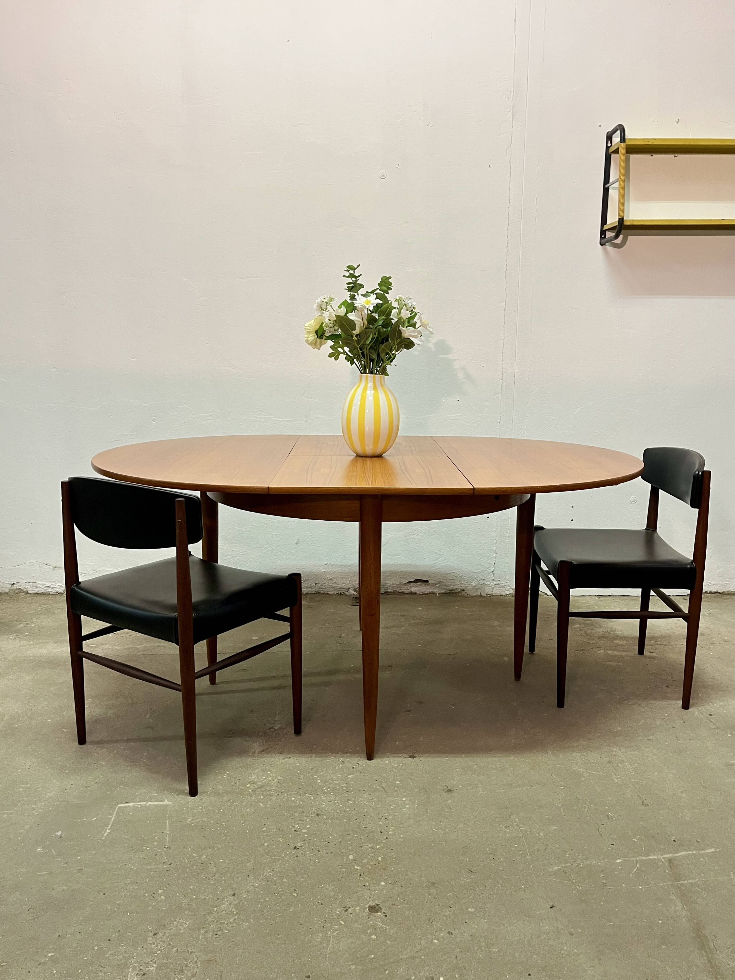 Vintage 1960s teak extendable Scandinavian table.