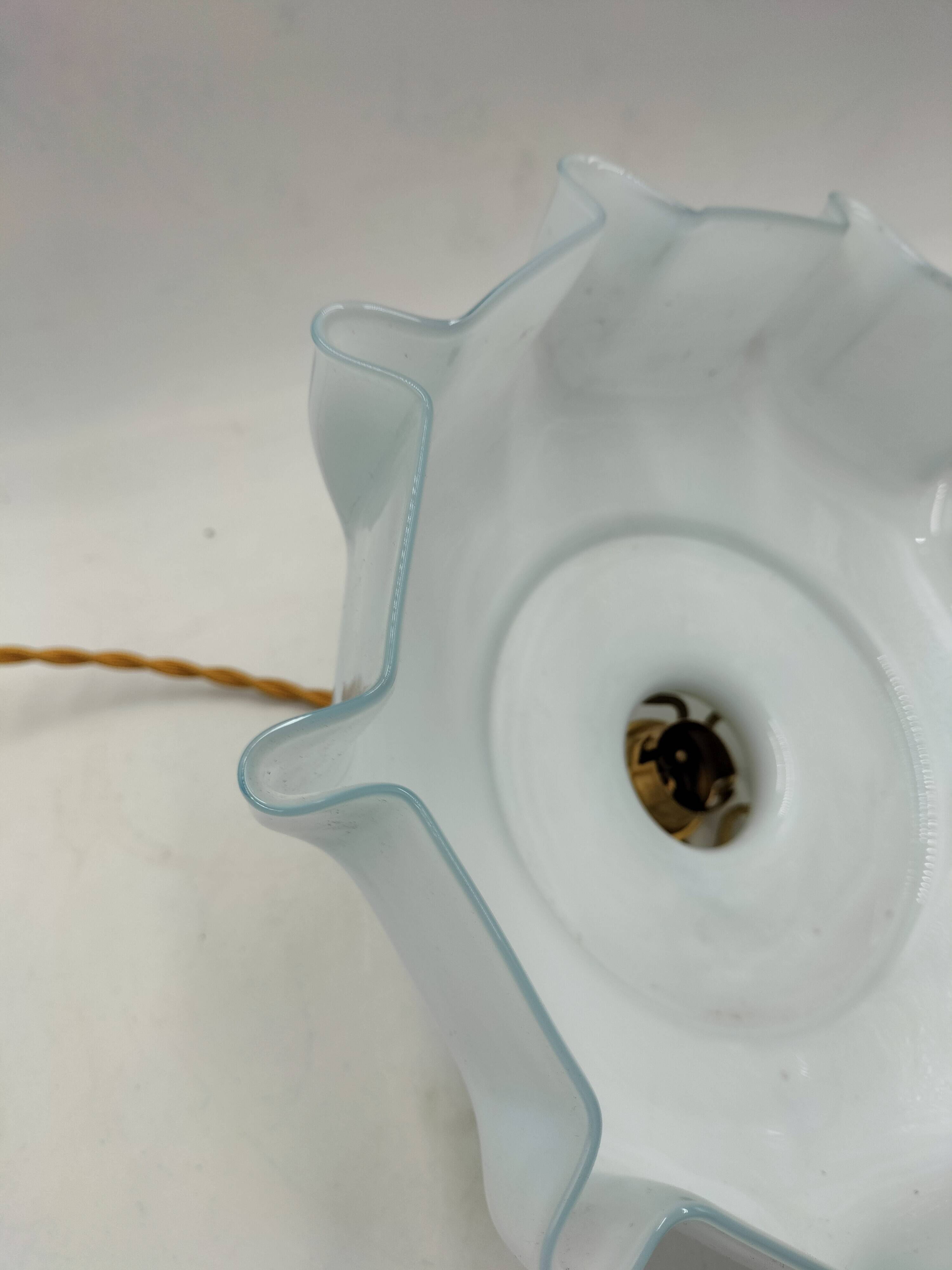 Blue opaline suspension