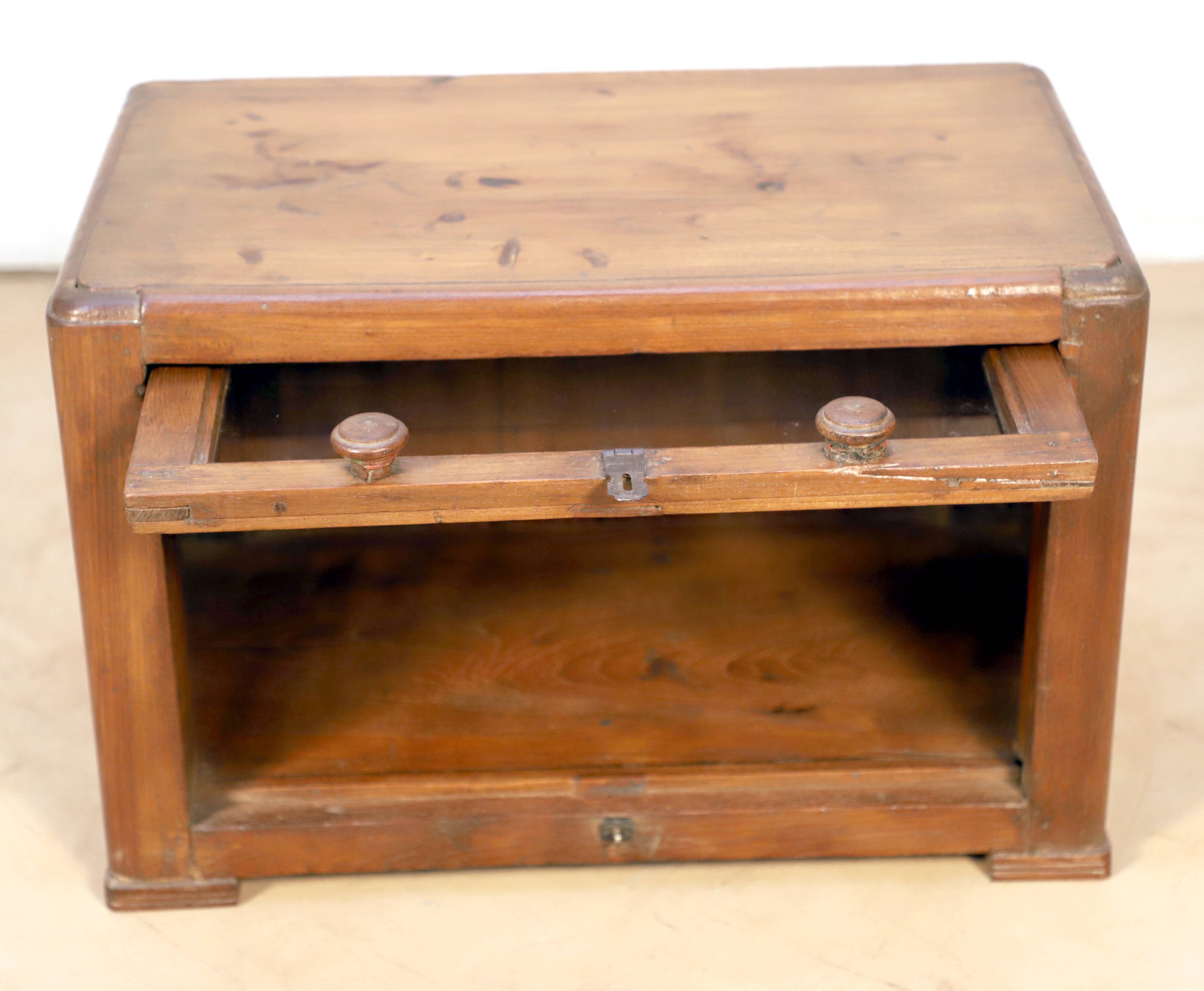 Art Deco showcase in Burmese teak