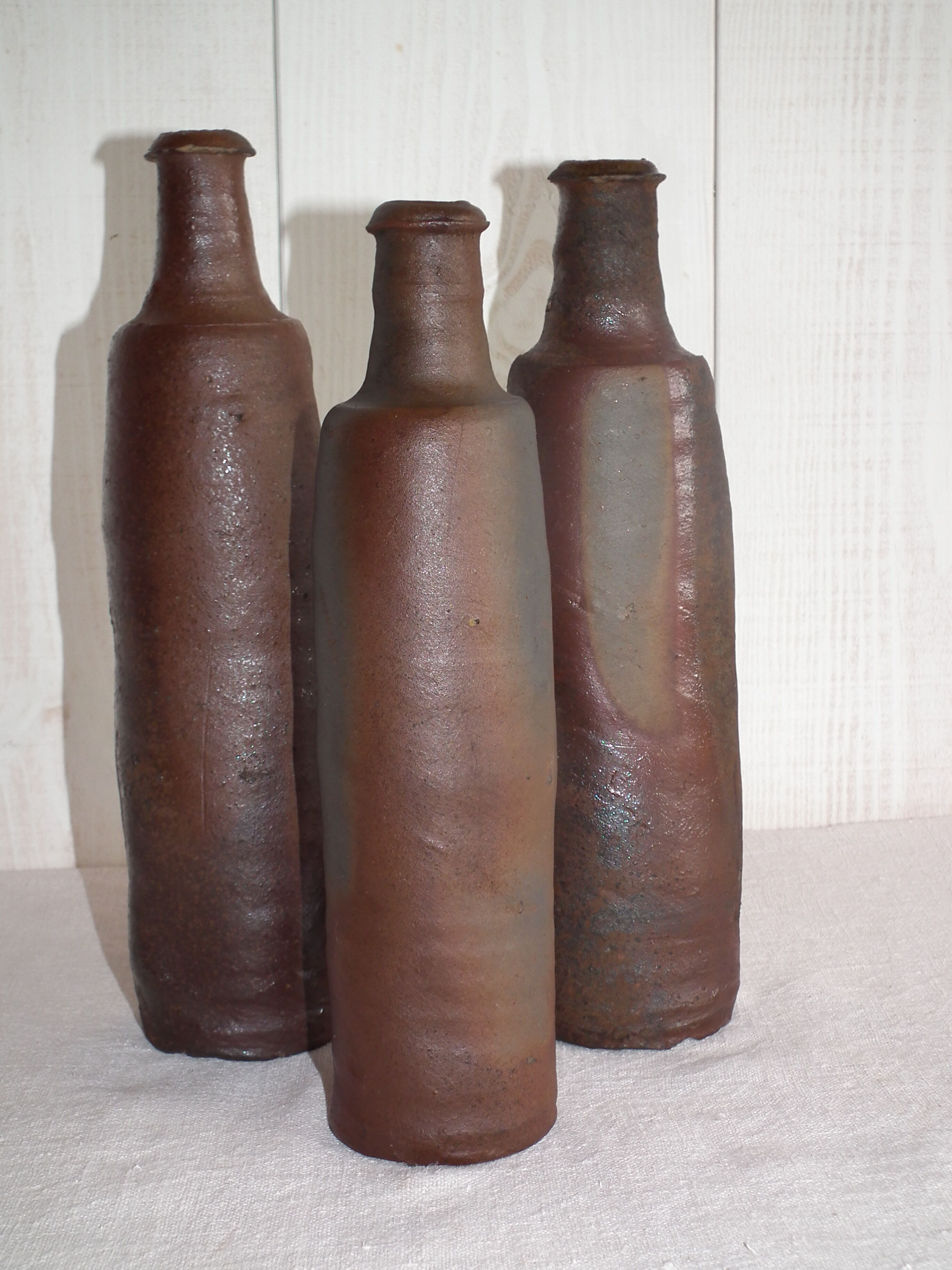 Set of vintage stoneware bottles