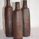 Set of vintage stoneware bottles