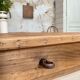 Vintage farmhouse table with turned legs.