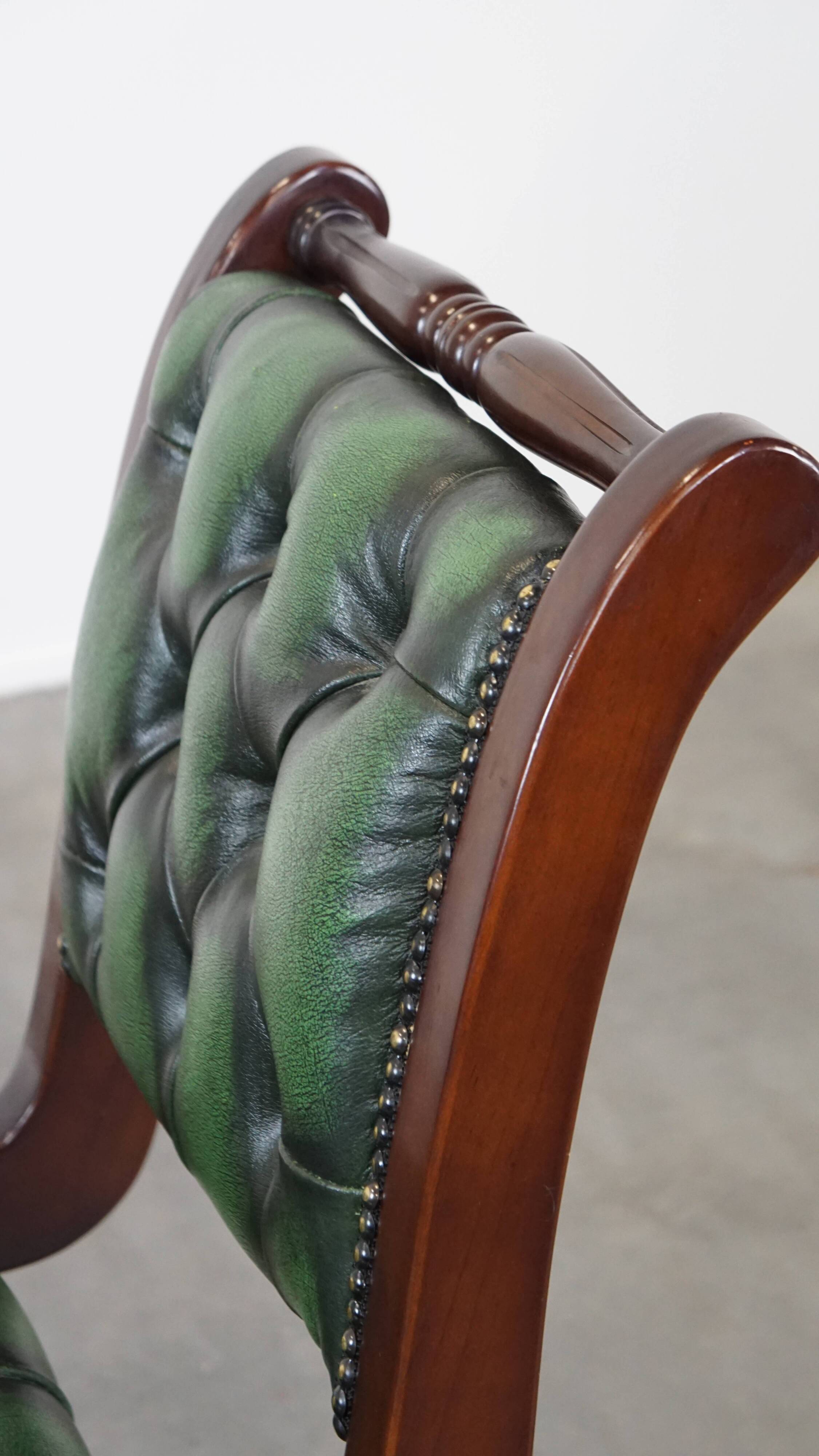 English Chesterfield office chair in green leather, height adjustable on casters