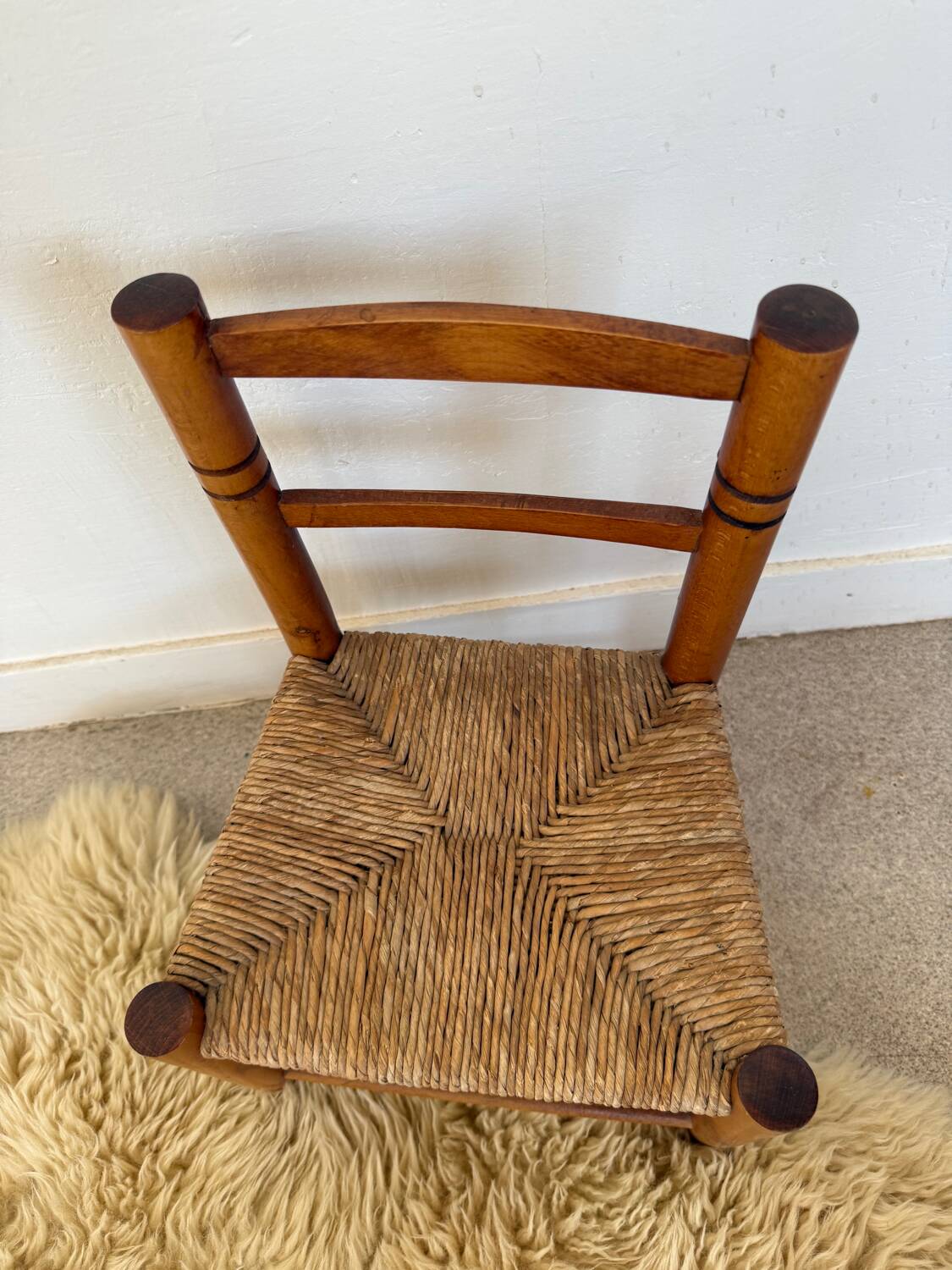 Vintage wooden and straw children's chair