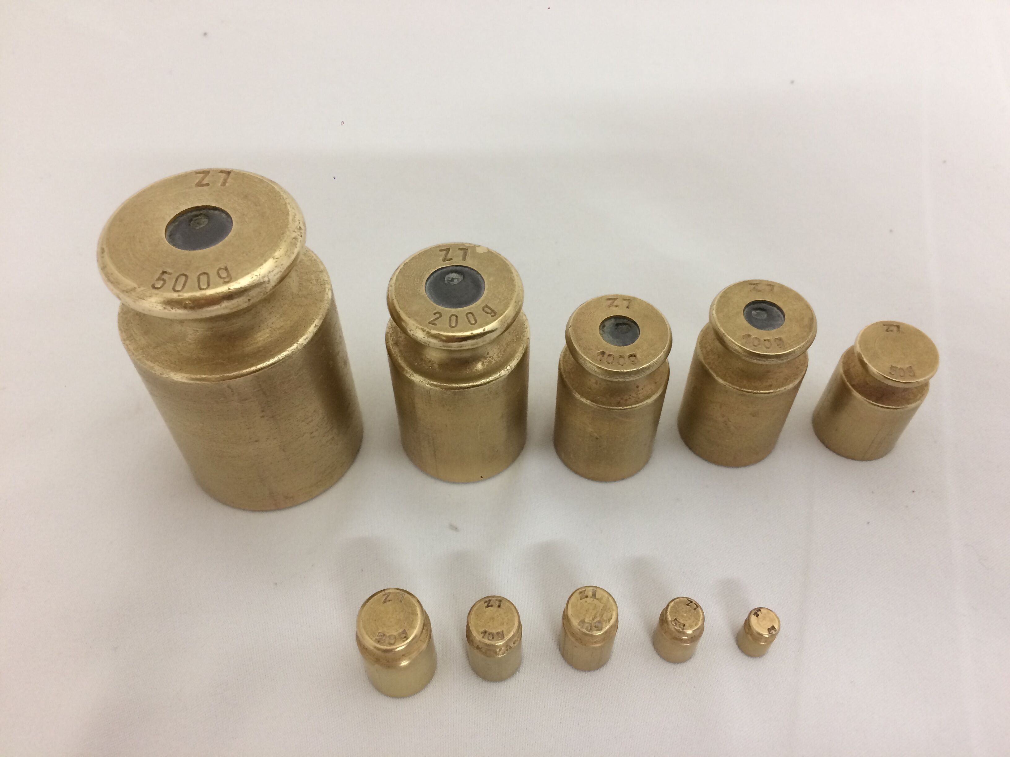Antique brass scale weight