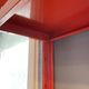 Modular red metal wall shelf in Congresso Lips Vago style.