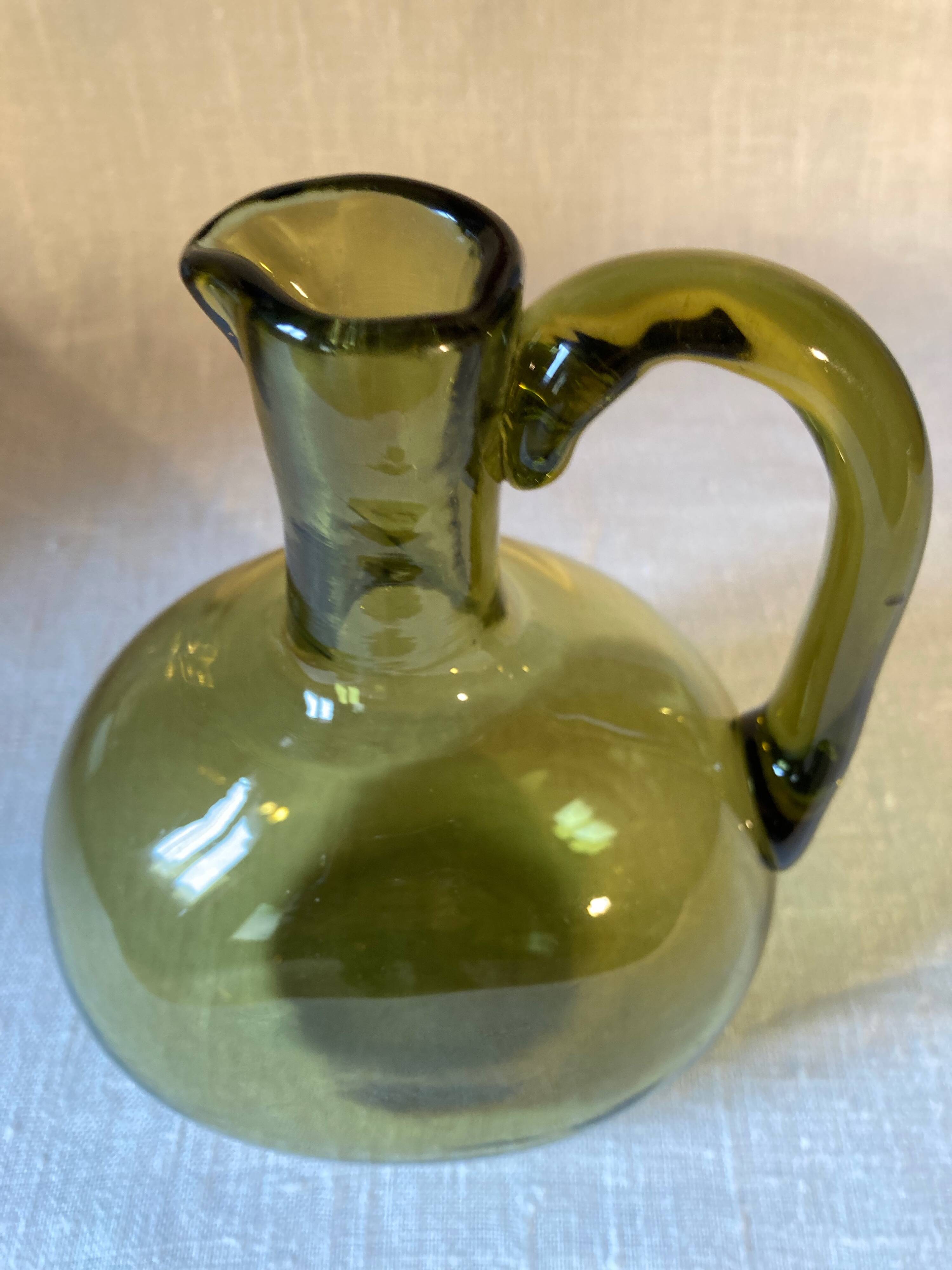Green blown glass carafe