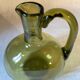 Green blown glass carafe