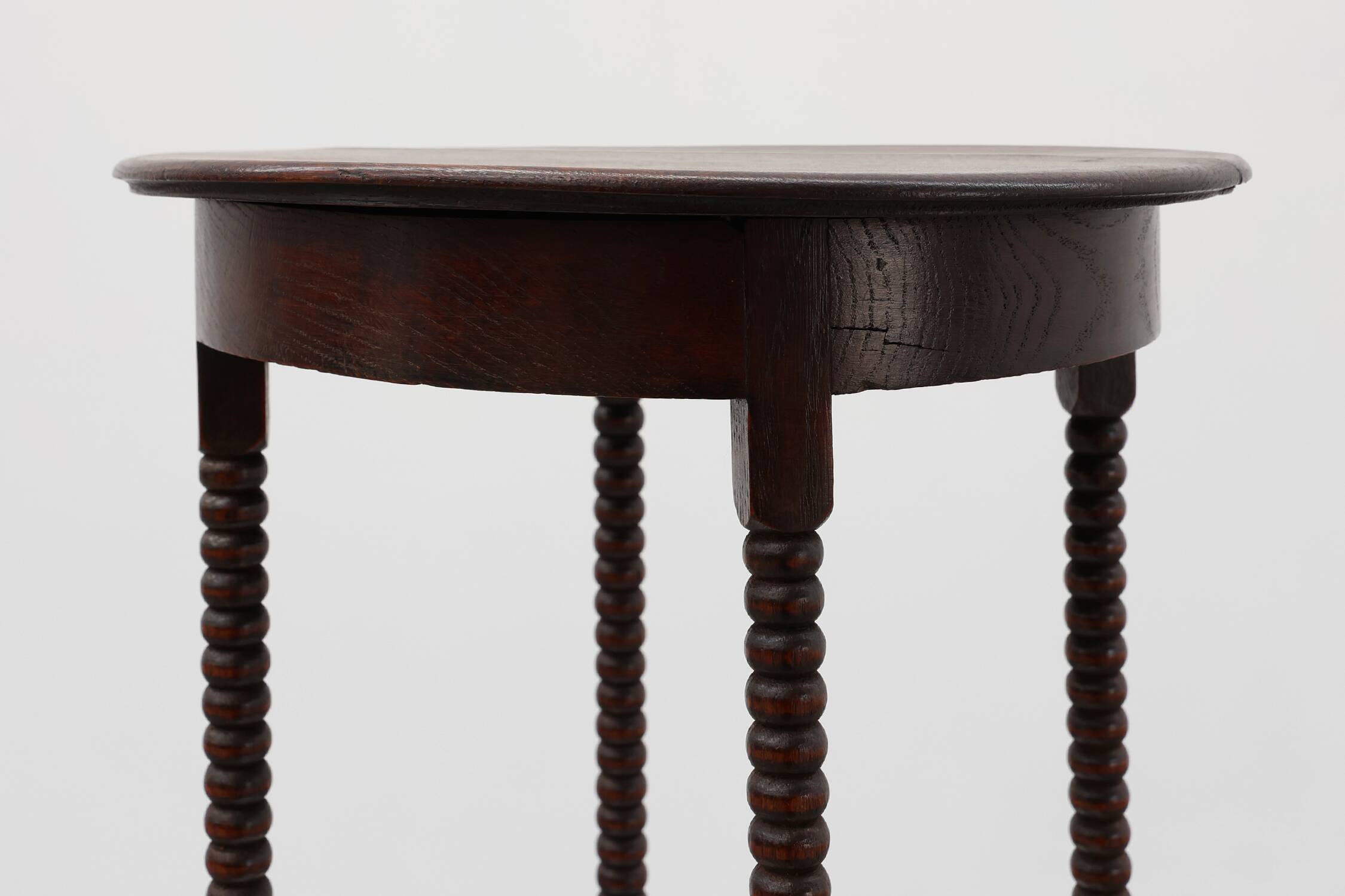 Art Deco round wooden side table with spindle legs, France circa 1900