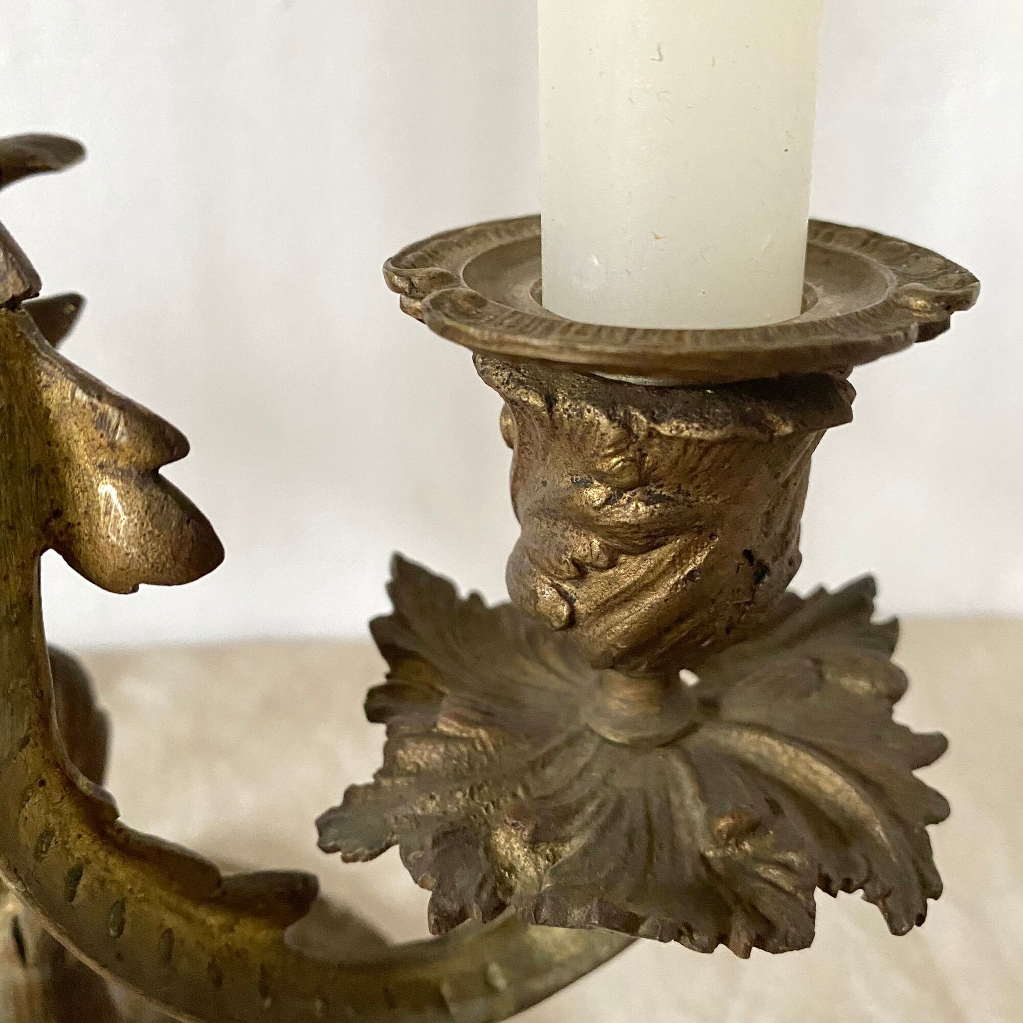 Pair of antique bronze candlesticks at the end of the table XIXth
