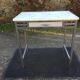 Vintage table with square chrome tubular metal base and marble top.