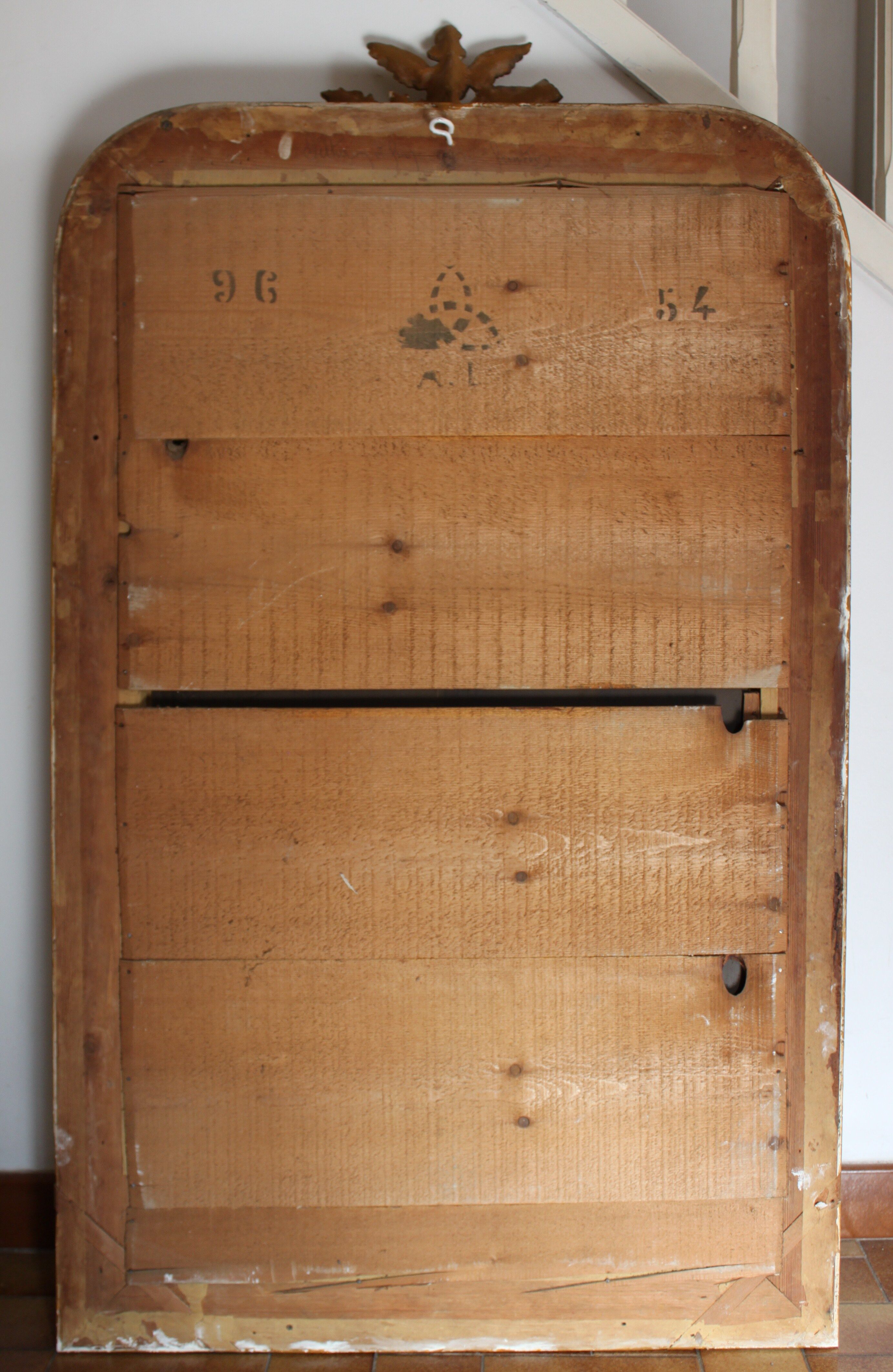 Old gilded mirror with A pediment