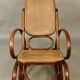 Rocking chair in curved wood