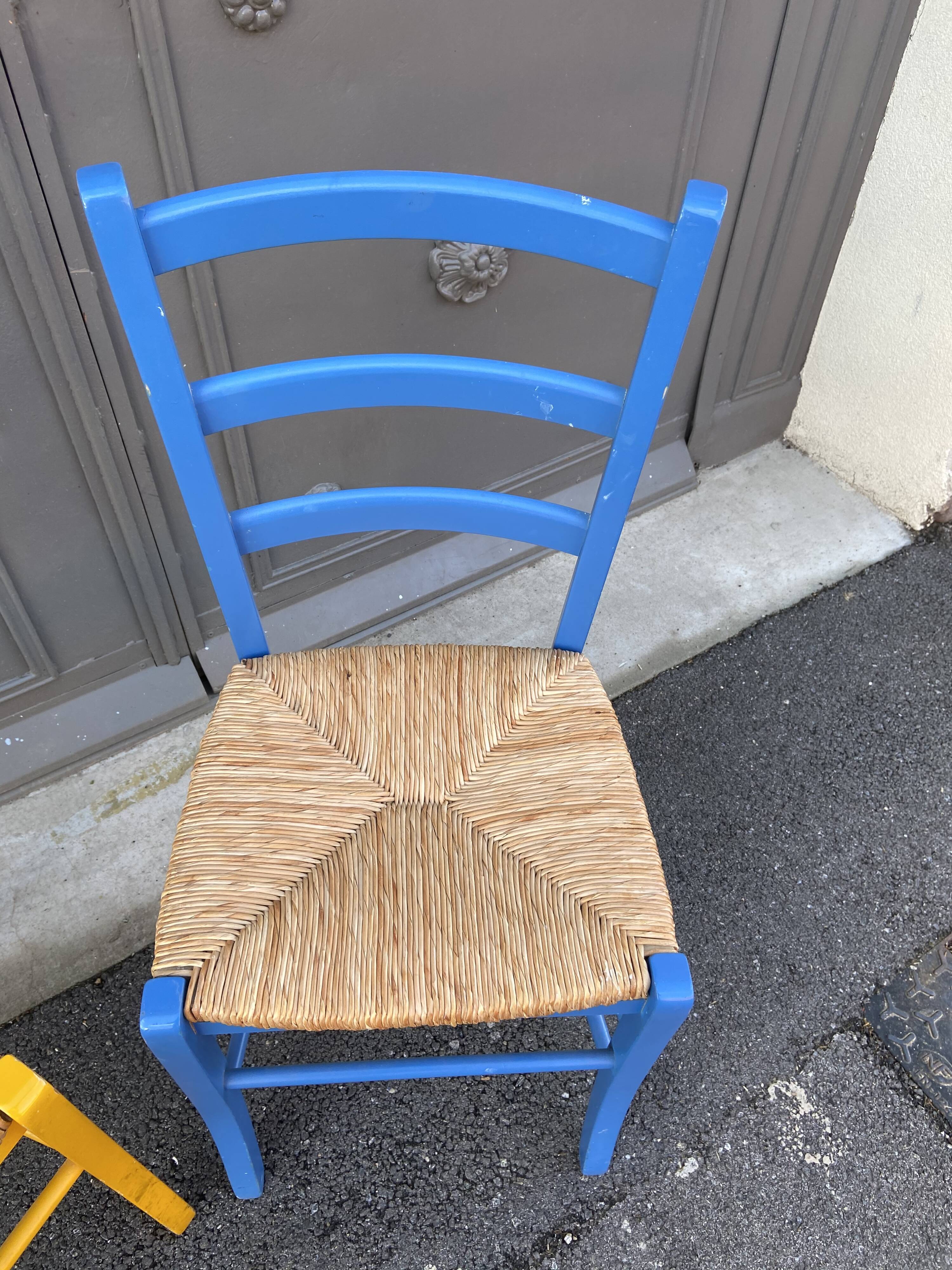 Fake pair of rustic vintage bistro chairs